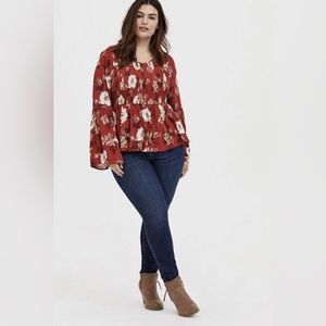 Torrid orange babydoll crinkle top with bell sleeves